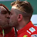www.sutton-images.com Race winner Sebastian Vettel (GER) Ferrari celebrates on the podium with the trophy at Formula One World Championship, Rd1, Australian Grand Prix, Race, Melbourne, Australia, Sunday 25 March 2018. © Sutton Images,Sutton Images