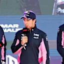 MELBOURNE, AUSTRALIA - MARCH 13: Sergio Perez of Mexico and Racing Point, Lance Stroll of Canada and Racing Point and Otmar Szafnauer, Team Principal and Chief Executive Officer of Racing Point talk on stage at the F1 Live event during previews ahead of the F1 Grand Prix of Australia at Melbourne Grand Prix Circuit on March 13, 2019 in Melbourne, Australia. (Photo by Charles Coates/Getty Images)\n