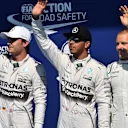 (L to R): Nico Rosberg (GER) Mercedes AMG F1, pole sitter Lewis Hamilton (GBR) Mercedes AMG F1 and Valtteri Bottas (FIN) Williams celebrate in parc ferme at Formula One World Championship, Rd11, Belgian Grand Prix, Qualifying, Spa Francorchamps, Belgium, Saturday 22 August 2015. &copy; Sutton Motorsport Images