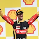 Third placed Romain Grosjean (FRA) Lotus F1 celebrates on the podium with the trophy at Formula One World Championship, Rd11, Belgian Grand Prix, Race, Spa Francorchamps, Belgium, Sunday 23 August 2015. &copy; Sutton Motorsport Images