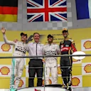 (L to R): Nico Rosberg (GER) Mercedes AMG F1, race winner Lewis Hamilton (GBR) Mercedes AMG F1 and Romain Grosjean (FRA) Lotus F1 celebrate on the podium at Formula One World Championship, Rd11, Belgian Grand Prix, Race, Spa Francorchamps, Belgium, Sunday 23 August 2015. &copy; Sutton Motorsport Images