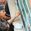 Lewis Hamilton (GBR) Mercedes AMG F1 signs autographs for fans at Formula One World Championship, Rd11, Belgian Grand Prix, Race, Spa Francorchamps, Belgium, Sunday 23 August 2015. &copy; Sutton Motorsport Images