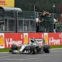 Race winner Lewis Hamilton (GBR) Mercedes AMG F1 W06 crosses the line and takes the chequered flag at Formula One World Championship, Rd11, Belgian Grand Prix, Race, Spa Francorchamps, Belgium, Sunday 23 August 2015. &copy; Sutton Motorsport Images
