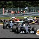 Lewis Hamilton (GBR) Mercedes AMG F1 W06 leads Sergio Perez (MEX) Force India VJM08 at the start of the race at Formula One World Championship, Rd11, Belgian Grand Prix, Race, Spa Francorchamps, Belgium, Sunday 23 August 2015. &copy; Sutton Motorsport Images