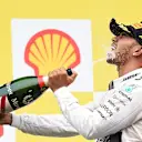 Race winner Lewis Hamilton (GBR) Mercedes AMG F1 celebrates on the podium with the champagne at Formula One World Championship, Rd11, Belgian Grand Prix, Race, Spa Francorchamps, Belgium, Sunday 23 August 2015. &copy; Sutton Motorsport Images