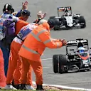 Fernando Alonso (ESP) McLaren MP4-30 passes the marshals at the end of the race at Formula One World Championship, Rd9, British Grand Prix, Race, Silverstone, England, Sunday 5 July 2015. &copy; Sutton Motorsport Images
