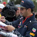 Daniel Ricciardo (AUS) Red Bull Racing signs autographs for the fans at Formula One World Championship, Rd1, Australian Grand Prix, Practice, Albert Park, Melbourne, Australia, Friday 18 March 2016. &copy; Sutton Motorsport Images