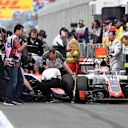 Rio Haryanto (IDN) Manor Racing MRT05 and Romain Grosjean (FRA) Haas VF-16 collide in pit lane in FP3 at Formula One World Championship, Rd1, Australian Grand Prix, Qualifying, Albert Park, Melbourne, Australia, Saturday 19 March 2016. &copy; Sutton Motorsport Images