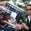 Jenson Button (GBR) McLaren signs autographs for the fans at Formula One World Championship, Rd1, Australian Grand Prix, Qualifying, Albert Park, Melbourne, Australia, Saturday 19 March 2016. &copy; Sutton Motorsport Images