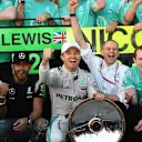 Lewis Hamilton (GBR) Mercedes AMG F1 and Nico Rosberg (GER) Mercedes AMG F1 celebrate with the trophies during team celbrations at Formula One World Championship, Rd1, Australian Grand Prix, Race, Albert Park, Melbourne, Australia, Sunday 20 March 2016. &copy; Sutton Motorsport Images