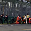 Marshals remove the car of Daniil Kvyat (RUS) Red Bull Racing RB12 after breaking down at the start of the race at Formula One World Championship, Rd1, Australian Grand Prix, Race, Albert Park, Melbourne, Australia, Sunday 20 March 2016. &copy; Sutton Motorsport Images