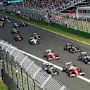 Sebastian Vettel (GER) Ferrari SF16-H leads Nico Rosberg (GER) Mercedes-Benz F1 W07 Hybrid and Lewis Hamilton (GBR) Mercedes-Benz F1 W07 Hybrid at the start of the race at Formula One World Championship, Rd1, Australian Grand Prix, Race, Albert Park, Melbourne, Australia, Sunday 20 March 2016. &copy; Sutton Motorsport Images