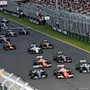 Sebastian Vettel (GER) Ferrari SF16-H leads Nico Rosberg (GER) Mercedes-Benz F1 W07 Hybrid and Lewis Hamilton (GBR) Mercedes-Benz F1 W07 Hybrid at the start of the race at Formula One World Championship, Rd1, Australian Grand Prix, Race, Albert Park, Melbourne, Australia, Sunday 20 March 2016. &copy; Sutton Motorsport Images