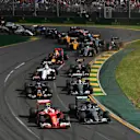Kimi Raikkonen (FIN) Ferrari SF16-H and Nico Rosberg (GER) Mercedes-Benz F1 W07 Hybrid battle at the start of the race at Formula One World Championship, Rd1, Australian Grand Prix, Race, Albert Park, Melbourne, Australia, Sunday 20 March 2016. &copy; Sutton Motorsport Images