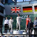 (L to R): Lewis Hamilton (GBR) Mercedes AMG F1, race winner Nico Rosberg (GER) Mercedes AMG F1 and Sebastian Vettel (GER) Ferrari on the podium at Formula One World Championship, Rd1, Australian Grand Prix, Race, Albert Park, Melbourne, Australia, Sunday 20 March 2016. &copy; Sutton Motorsport Images