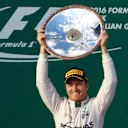 Race winner Nico Rosberg (GER) Mercedes AMG F1 celebrates on the podium with the trophy at Formula One World Championship, Rd1, Australian Grand Prix, Race, Albert Park, Melbourne, Australia, Sunday 20 March 2016. &copy; Sutton Motorsport Images
