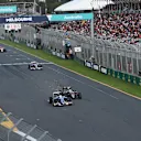 Marcus Ericsson (SWE) Sauber C35 Jenson Button (GBR) McLaren MP4-31 battle and at Formula One World Championship, Rd1, Australian Grand Prix, Race, Albert Park, Melbourne, Australia, Sunday 20 March 2016. &copy; Sutton Motorsport Images
