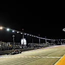Carlos Sainz (ESP) Scuderia Toro Rosso STR11 takes the chequered flag at the end of Qualifying at Formula One World Championship, Rd15, Singapore Grand Prix, Qualifying, Marina Bay Street Circuit, Singapore, Saturday 17 September 2016. &copy; Sutton Images
