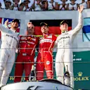 Lewis Hamilton (GBR) Mercedes AMG F1, Luigi Fraboni (ITA) Ferrari Head of Engine Trackside Operations, race winner Sebastian Vettel (GER) Ferrari and Valtteri Bottas (FIN) Mercedes AMG F1 celebrate on the podium at Formula One World Championship, Rd1, Australian Grand Prix, Race, Albert Park, Melbourne, Australia, Sunday 26 March 2017. © Sutton Motorsport Images