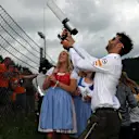 Daniel Ricciardo (AUS) Red Bull Racing fires T-Shirts into the crowd with T-Shirt gun at Formula One World Championship, Rd9, Austrian Grand Prix, Race, Spielberg, Austria, Sunday 9 July 2017. © Sutton Images