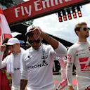 Valtteri Bottas (FIN) Mercedes AMG F1, Lewis Hamilton (GBR) Mercedes AMG F1 and Romain Grosjean (FRA) Haas F1 on the grid on the grid at Formula One World Championship, Rd9, Austrian Grand Prix, Race, Spielberg, Austria, Sunday 9 July 2017. © Sutton Images