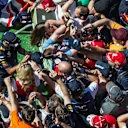 From Sunday... Daniel Ricciardo (AUS) Red Bull Racing signs autographs for the fans at Formula One World Championship, Rd9, Austrian Grand Prix, Race, Spielberg, Austria, Sunday 9 July 2017. © Sutton Images