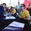 Jolyon Palmer (GBR) Renault Sport F1 Team RS17 signs autographs for the fans at the autograph session at Formula One World Championship, Rd8, Azerbaijan Grand Prix, Qualifying, Baku City Circuit, Baku, Azerbaijan, Saturday 24 June 2017. © Sutton Images