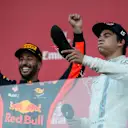 Lance Stroll (CDN) Williams celebrates on the podium with race winner Daniel Ricciardo (AUS) Red Bull Racing and does a Shoey with the champagne at Formula One World Championship, Rd8, Azerbaijan Grand Prix, Race, Baku City Circuit, Baku, Azerbaijan, Sunday 25 June 2017. © Sutton Images