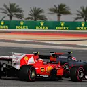Kimi Raikkonen (FIN) Ferrari SF70-H and Kevin Magnussen (DEN) Haas VF-17 at Formula One World Championship, Rd3, Bahrain Grand Prix Qualifying, Bahrain International Circuit, Sakhir, Bahrain, Saturday 15 April 2017. © Sutton Motorsport Images