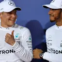 Pole sitter Valtteri Bottas (FIN) Mercedes AMG F1 and Lewis Hamilton (GBR) Mercedes AMG F1 celebrate in parc ferme at Formula One World Championship, Rd3, Bahrain Grand Prix Qualifying, Bahrain International Circuit, Sakhir, Bahrain, Saturday 15 April 201