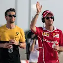 Sebastian Vettel (GER) Ferrari and Jolyon Palmer (GBR) Renault Sport F1 Team on the drivers parade at Formula One World Championship, Bahrain Grand Prix Race, Bahrain International Circuit, Sakhir, Bahrain, Sunday 16 April 2017. © Sutton Motorsport Images