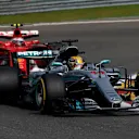 Lewis Hamilton (GBR) Mercedes-Benz F1 W08 Hybrid and Sebastian Vettel (GER) Ferrari SF70-H battle for position at Formula One World Championship, Rd12, Belgian Grand Prix, Race, Spa Francorchamps, Belgium, Sunday 27 August 2017. © Sutton Images