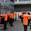 McLaren mechanics warm up excercise at Formula One World Championship, Rd12, Belgian Grand Prix, Race, Spa Francorchamps, Belgium, Sunday 27 August 2017. © Sutton Images