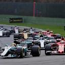 Lewis Hamilton (GBR) Mercedes-Benz F1 W08 Hybrid and Sebastian Vettel (GER) Ferrari SF70-H at the re-start at Formula One World Championship, Rd12, Belgian Grand Prix, Race, Spa Francorchamps, Belgium, Sunday 27 August 2017. © Sutton Images