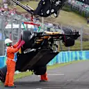 The crashed car of Jolyon Palmer (GBR) Renault Sport F1 Team RS17 is recovered by Marshals in FP2 at Formula One World Championship, Rd11, Hungarian Grand Prix, Practice, Hungaroring, Hungary, Friday 28 July 2017. © Sutton Images