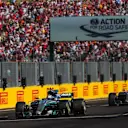 Valtteri Bottas (FIN) Mercedes-Benz F1 W08 Hybrid and Lewis Hamilton (GBR) Mercedes-Benz F1 W08 Hybrid cross the line to take the chequered flag and third and fourth positions respectively at Formula One World Championship, Rd11, Hungarian Grand Prix, Race, Hungaroring, Hungary, Sunday 30 July 2017. © Sutton Images