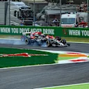 Kevin Magnussen (DEN) Haas VF-17 locks up and runs wide alongside Sebastian Vettel (GER) Ferrari SF70-H at Formula One World Championship, Rd13, Italian Grand Prix, Practice, Monza, Italy, Friday 1 September 2017. © Sutton Images