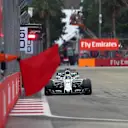 Felipe Massa (BRA) Williams FW40 and Marshal waves a red flag at Formula One World Championship, Rd14, Singapore Grand Prix, Qualifying, Marina Bay Street Circuit, Singapore, Saturday 16 September 2017. © Sutton Images