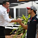 Eric Boullier (FRA) McLaren Racing Director and Carlos Sainz jr (ESP) Scuderia Toro Rosso at Formula One World Championship, Rd14, Singapore Grand Prix, Preparations, Marina Bay Street Circuit, Singapore, Thursday 14 September 2017. © Sutton Images