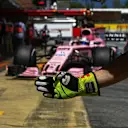 Sergio Perez (MEX) Force India VJM10 and Force India mechanics glove at Formula One World Championship, Rd5, Spanish Grand Prix, Practice, Barcelona, Spain, Friday 12 May 2017. © Sutton Motorsport Images