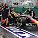 Red Bull Racing mechanics push Red Bull Racing RB14 in pit lane at Formula One World Championship, Rd1, Australian Grand Prix, Qualifying, Melbourne, Australia, Saturday 24 March 2018. © Mark Sutton/Sutton Images