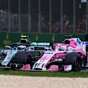 Valtteri Bottas (FIN) Mercedes-AMG F1 W09 EQ Power+ and Sergio Perez (MEX) Force India battle at Formula One World Championship, Rd1, Australian Grand Prix, Race, Melbourne, Australia, Sunday 25 March 2018. © Daniel Kalisz/Sutton Images