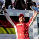 Race winner Sebastian Vettel (GER) Ferrari celebrates on the podium with the trophy and the champagne at Formula One World Championship, Rd1, Australian Grand Prix, Race, Melbourne, Australia, Sunday 25 March 2018. © Manuel Goria/Sutton Images