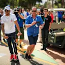 Lewis Hamilton (GBR) Mercedes-AMG F1 on a scooter at Formula One World Championship, Rd1, Australian Grand Prix, Race, Melbourne, Australia, Sunday 25 March 2018.