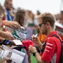 Sebastian Vettel (GER) Ferrari signs autographs for the fans at Formula One World Championship, Rd9, Austrian Grand Prix, Qualifying, Spielberg, Austria, Saturday 30 June 2018. © Manuel Goria/Sutton Images