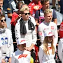Grid kids and drivers observe the National Anthem on the grid at Formula One World Championship, Rd9, Austrian Grand Prix, Race, Spielberg, Austria, Sunday 1 July 2018. © Jerry Andre/Sutton Images