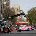The crashed car of Esteban Ocon (FRA) Force India VJM11 is recovered at Formula One World Championship, Rd4, Azerbaijan Grand Prix, Race, Baku City Circuit, Baku, Azerbaijan, Sunday 29 April 2018. © James Gasperotti/Sutton Images