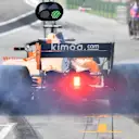 Fernando Alonso (ESP) McLaren MCL33 and tyre smoke at Formula One World Championship, Rd2, Bahrain Grand Prix, Practice, Bahrain International Circuit, Sakhir, Bahrain, Friday 6 April 2018. © Mark Sutton/Sutton Images