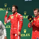 Hamilton (GBR) Mercedes-AMG F1,  Vettel (GER) Ferrari and Raikkonen (FIN) Ferrari celebrate on the podium at Formula One World Championship, Rd10, British Grand Prix, Race, Silverstone, England, Sunday 8 July 2018. © Mark Sutton/Sutton Images