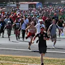 Fans invade the track at Formula One World Championship, Rd10, British Grand Prix, Race, Silverstone, England, Sunday 8 July 2018. © Mark Sutton/Sutton Images